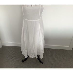 White summer dress with a beautiful eyelet design